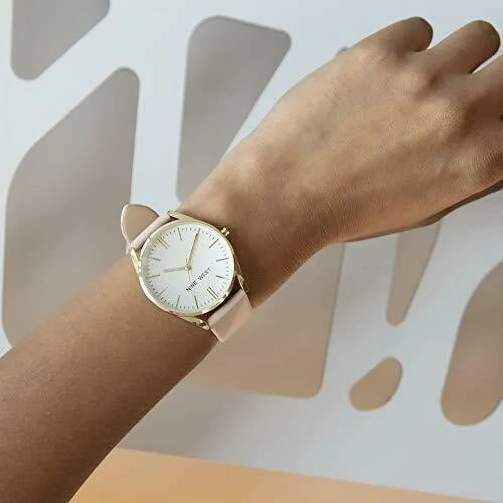 Nine West Women's Gold-Tone and Pastel Pink Strap NW/1994WTPK Watch